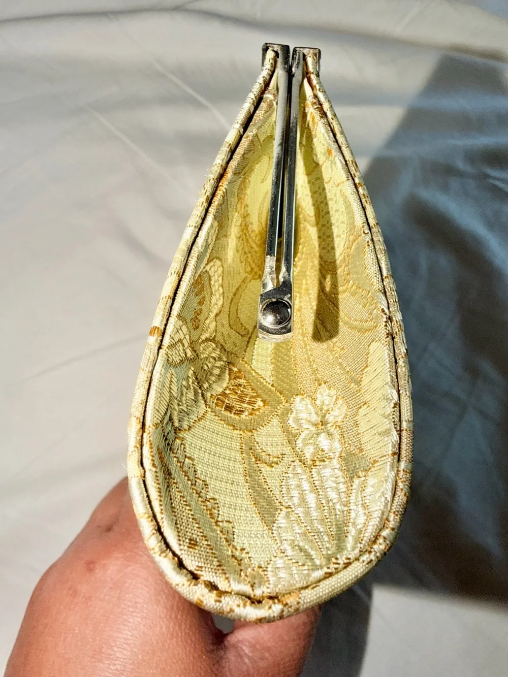 Viintage-style evening clutch features gold/green floral damask metal kiss lock
